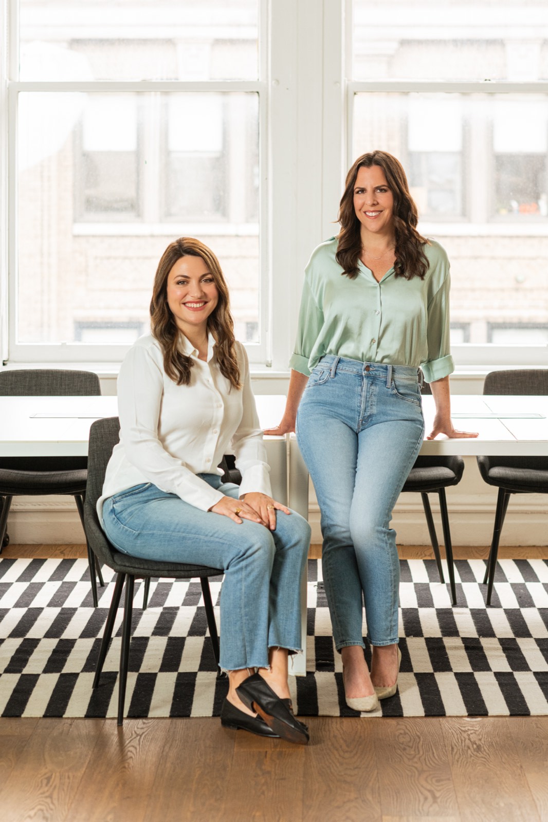 Two members of The Luupe team photographed in their studio